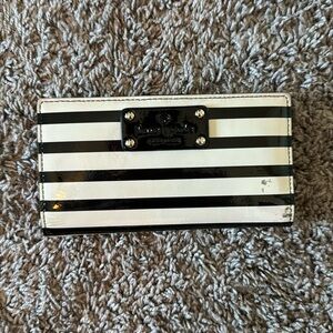 Striped black and white, shiny Kate Spade card wallet